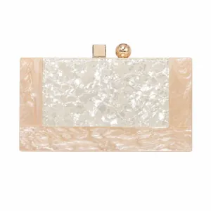 Elegant acrylic clutch evening bag with marble texture and golden metal clasp for women