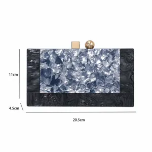 Front view of evening clutch with dimensions 20.5x11x4.5cm and geometric gold clasp