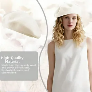 Detail of off-white wool blend beret showing soft texture and cozy fit on female model