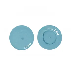 Detail view of blue wool beret showing both top exterior and inner structure with lining