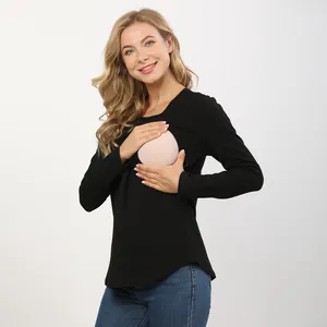 Detail of the side opening design on a black long sleeve maternity and nursing t-shirt