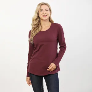 Detailed view of burgundy long sleeve breastfeeding top with soft elastic fabric texture