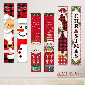 Close-up of festive Christmas banners featuring Santa, snowmen, and red plaid designs