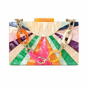 Colorful sunburst acrylic evening clutch bag with marble texture and resin chain