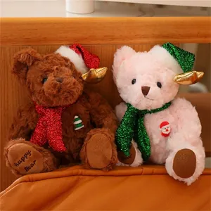 Detail of Christmas teddy bears with sequined hats and antlers in festive indoor setting