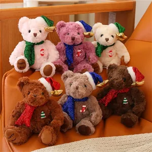 Detailed view of colorful Christmas plush teddy bears with festive hats and scarves