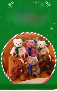 Set of six colorful Christmas teddy bears with sequin scarves and golden reindeer antlers