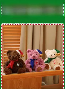 Detailed view of colorful plush Christmas teddy bears with sequin hats and scarves