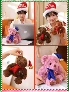 Detail of Christmas teddy bears with sequined hats, scarves and festive embroidery