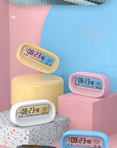 Smart digital alarm clock with transparent screen showing weather, temp, and humidity
