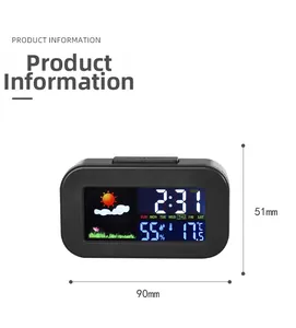 Close-up of smart digital clock screen showing temperature, humidity and weather forecast