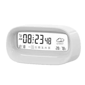 Smart white digital alarm clock with weather icon temperature and humidity LCD display