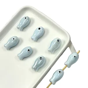 Handmade light blue ceramic fish beads with glossy glaze for DIY jewelry making