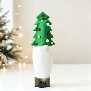 Detail of Christmas gnome wine bottle cover with green felt tree hat and white faux beard