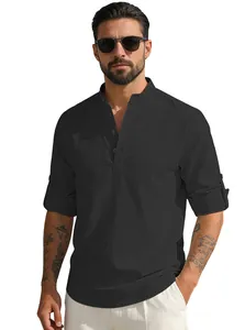 Detail of men's black linen shirt featuring stand collar and roll-up sleeve buttons