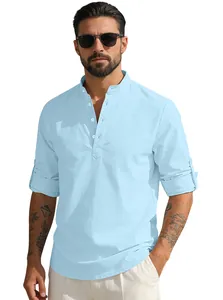 Detail of light blue linen shirt featuring a mandarin collar and half-button placket design