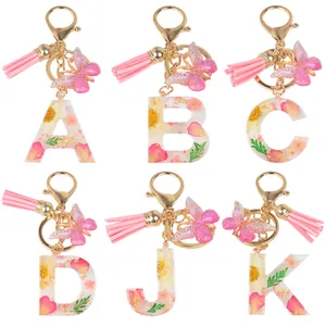 Handmade Pink Resin Letter Keychain With Real Dried Flower Gold Foil Tassel Butterfly Charm Fashion Keychain Pendant For Women Gift