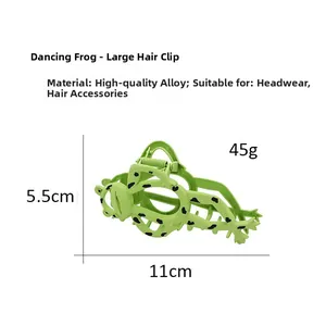 Detail view of funny green frog hair claw clip made of high-quality alloy, size 11x5.5cm