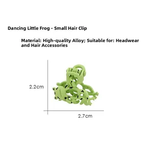 Mini green cartoon frog hair claw clip made of durable alloy with size details