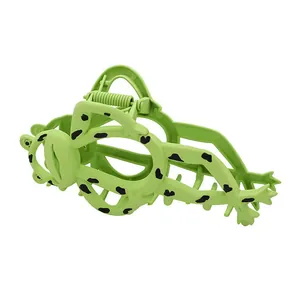 Creative green cartoon frog hair claw clip with black spots and matte finish for women