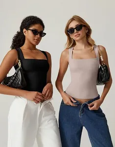 Close-up of square neck sleeveless bodysuits in black and dusty pink with high elasticity