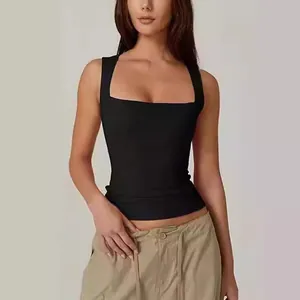 Close-up of slim fit black square neck tank top paired with khaki cargo pants on a model