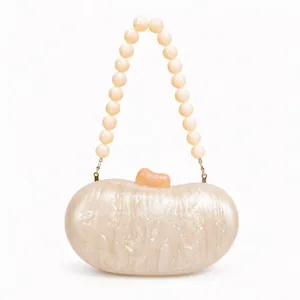 Elegant ivory pearl acrylic evening clutch bag with beaded handle and marble texture