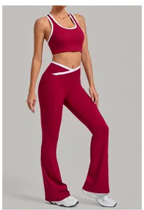 Detail of burgundy yoga set featuring V-shaped cross waistband and side functional pockets