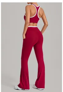 Detail of burgundy yoga set featuring racerback top and flared leggings with side pockets