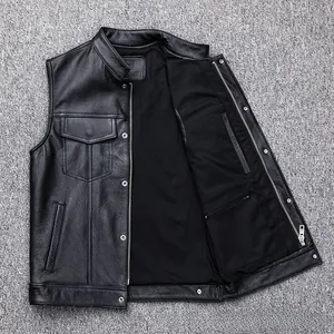 Close-up of matte black faux leather vest showing metal zipper and inner hidden pocket