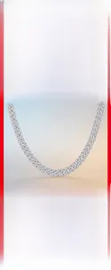 Close-up of 925 sterling silver Cuban link necklace set with sparkling moissanite stones
