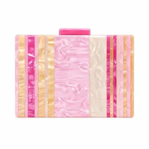 Elegant acrylic evening clutch bag with colorful marble stripes and metal chain strap