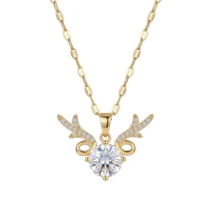 Elegant gold titanium necklace featuring a sparkling reindeer antler pendant with zircon