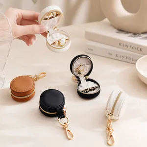 Portable mini round jewelry travel case with zipper and keychain for rings and earrings