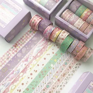 Pastel washi tape set with gold foil detailing in a purple gift box for journaling
