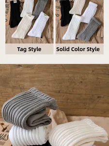 Detail of ribbed cotton socks showing the difference between label and solid color styles