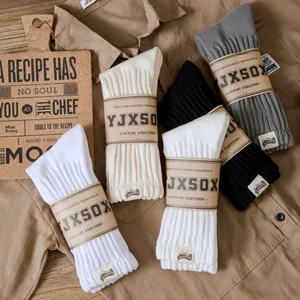 Vintage cotton knit mid-calf socks in diverse colors with textured ribbed design