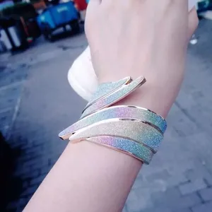 Punk angel wing open bangle with gradient glitter finish and rose gold edging