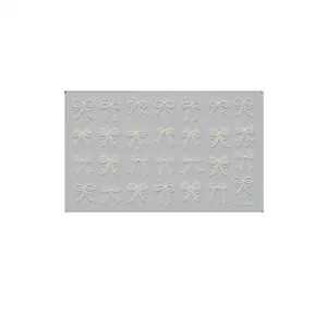 3D white bowknot nail art stickers featuring elegant lace designs for manicures