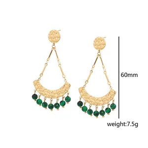 Detail view of 60mm bohemian gold dangle earrings with green malachite beads and hammering