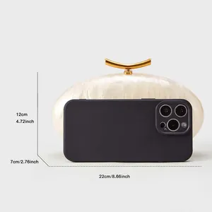 Size guide for acrylic marble evening bag: 22x12x7cm shown with a smartphone reference