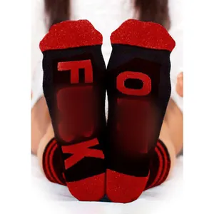 Funny novelty crew socks with red toe accents and bold letter print on the soles