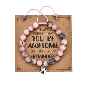 Detail of beaded heart bracelet with 8mm zebra stone and adjustable card packaging