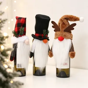 Christmas gnome wine bottle covers with reindeer antlers and festive hats for table decor