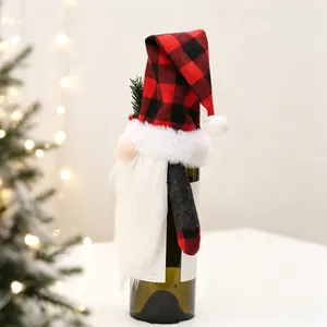 Christmas gnome wine bottle cover with red plaid hat and pine berry detail