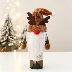 Detail of reindeer gnome wine bottle cover with brown plush antlers and white beard