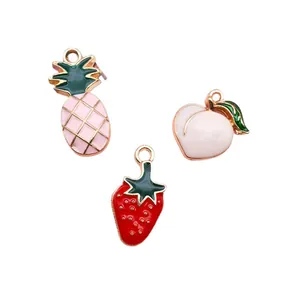 Enameled fruit charms including pineapple, strawberry, and peach for DIY jewelry making