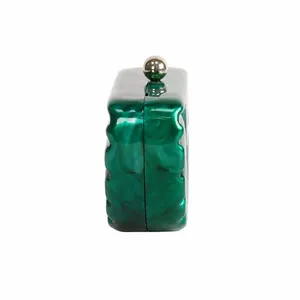 Emerald marble acrylic shell clutch with wavy sides and silver spherical metal clasp