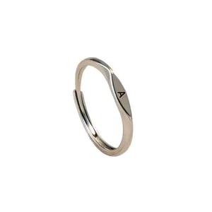 Adjustable silver letter A ring featuring a minimalist polished surface and open design