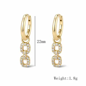 Detail of 925 sterling silver geometric drop earrings with white zircon and size specs